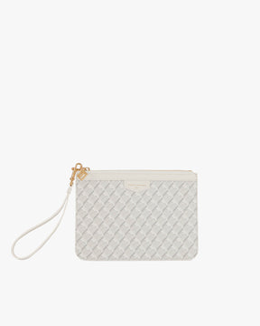 Pochette PM Monogram ivoire, vue de face, posée, avec dragonne en cuir détachée