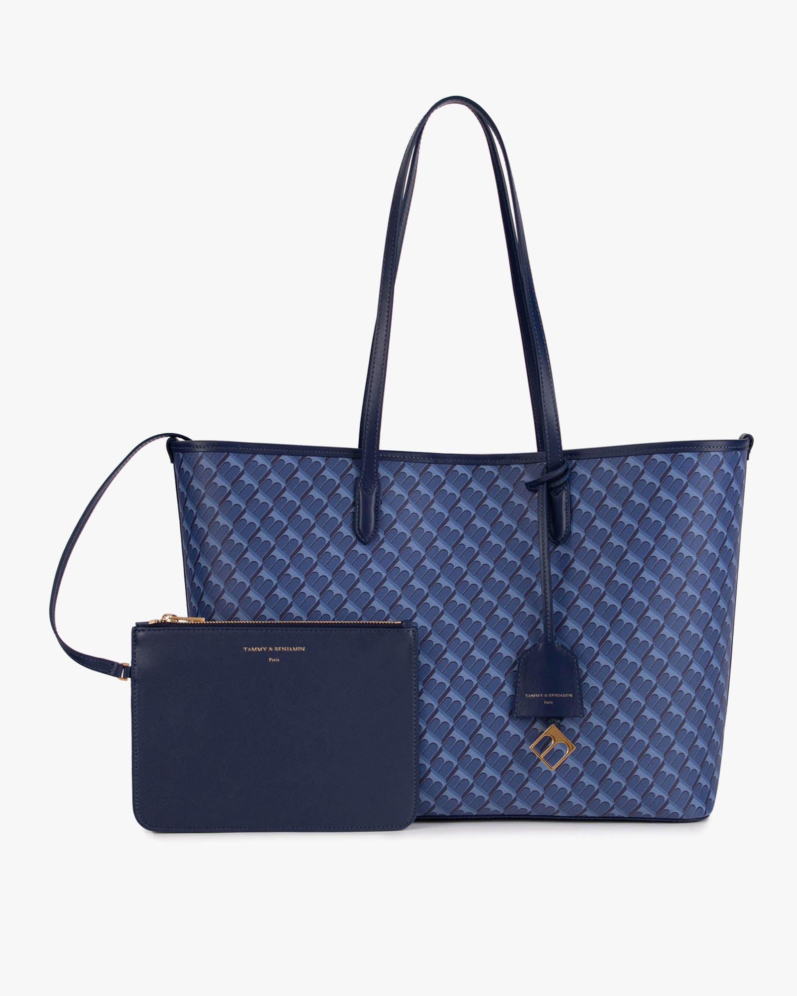 Tote Monogram bleu posé de face avec pochette amovible, anses plates en cuir