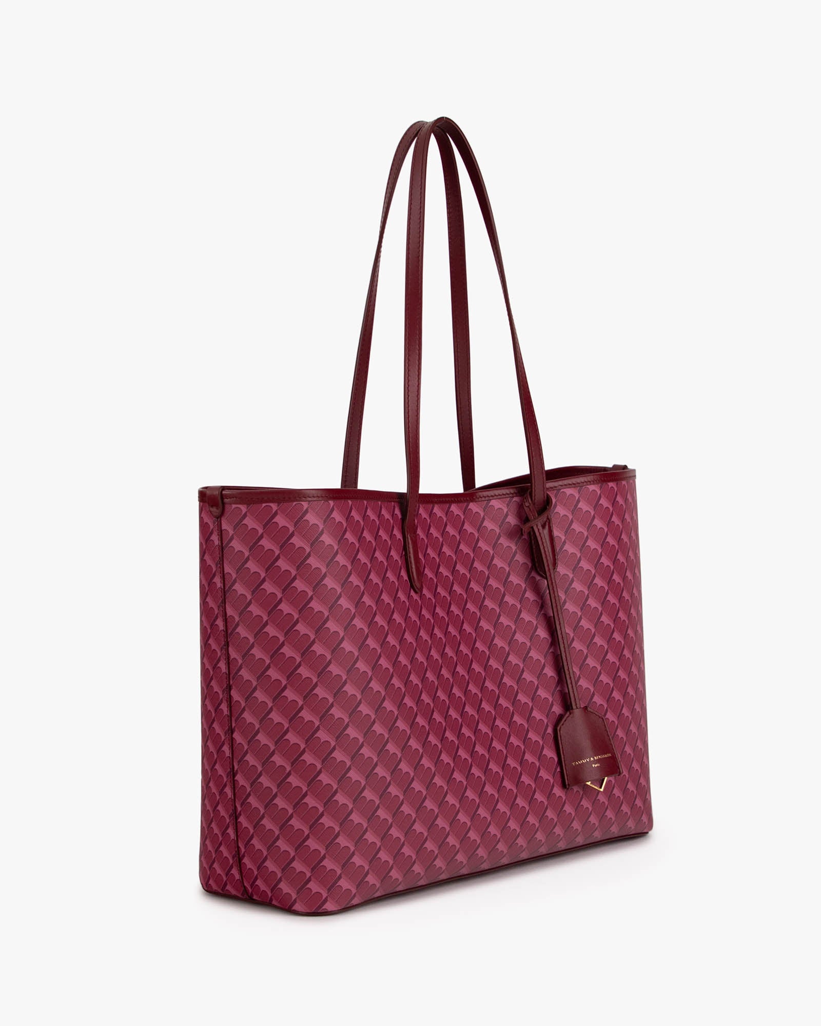 TOTE MONOGRAM Bordeaux, vue de trois quarts, posé, anses longues en cuir, motif monogram