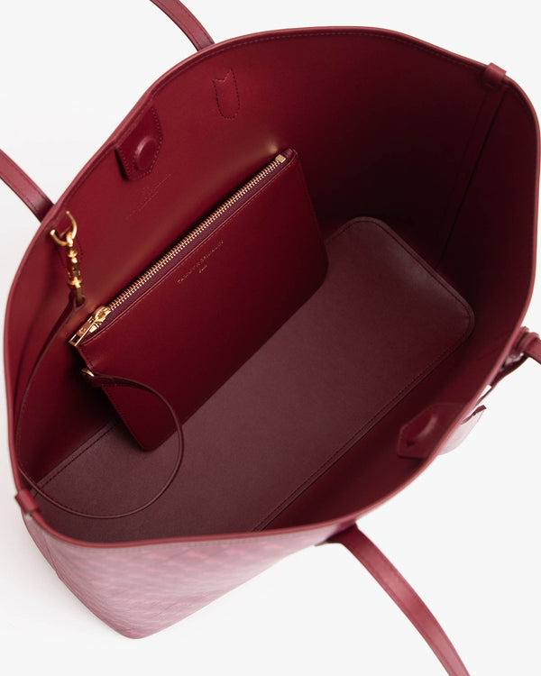 TOTE MONOGRAM Bordeaux vu de dessus, intérieur ouvert avec pochette zippée amovible
