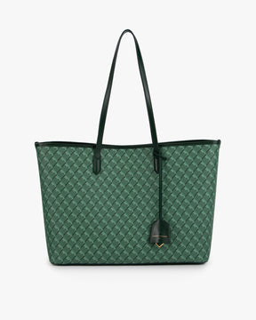 Sac TOTE MONOGRAM vert de face, posé, motif architecte sur toile enduite et anses plates en cuir