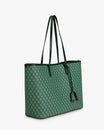 TOTE MONOGRAM vert, vue de trois quarts, posé, anses hautes en cuir et pampille logo