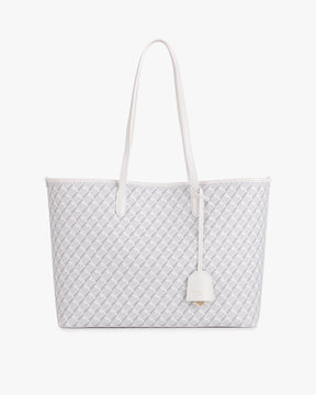 TOTE MONOGRAM blanc ivoire, vue de face, anses longues en cuir, posé sur fond blanc