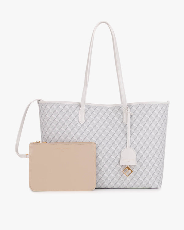 Tote Monogram ivoire posé de face avec ses deux anses et pochette amovible beige assortie
