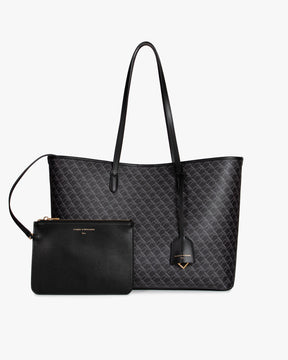 Tote Monogram noir, vue de face posé avec pochette zippée amovible devant et anses longues en cuir