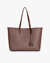 TOTE MONOGRAM in brown, front view, standing, long leather handles and hanging tag visible