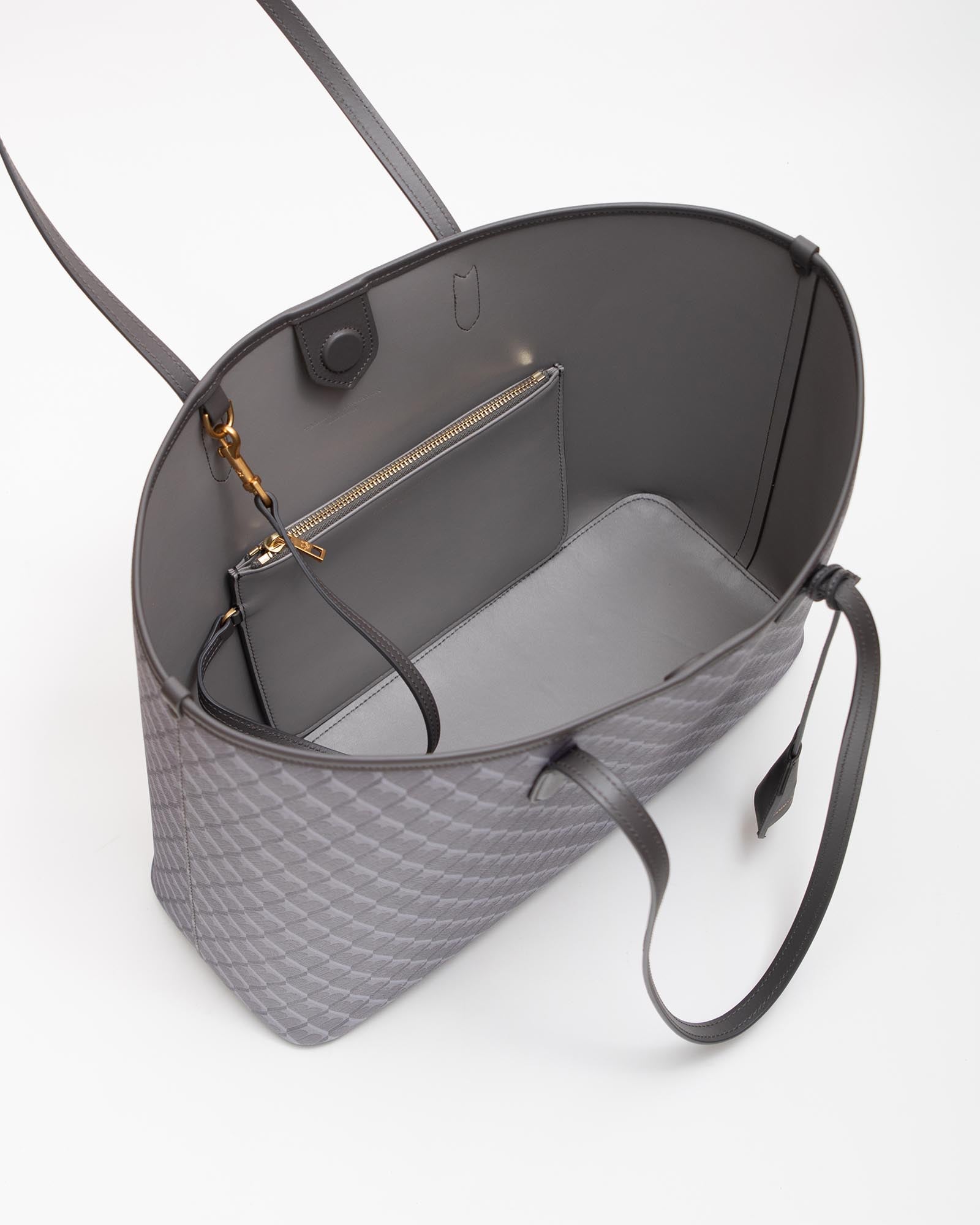 TOTE MONOGRAM gris, vue intérieure ouverte montrant la pochette zippée amovible et les anses