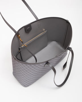 TOTE MONOGRAM gris, vue intérieure ouverte montrant la pochette zippée amovible et les anses
