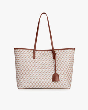 TOTE MONOGRAM tan et brun, vue de face, posé, avec ses deux anses plates en cuir