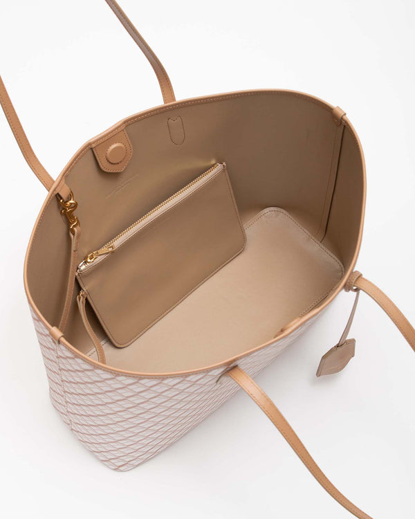 Sac tote ouvert vue de dessus, intérieur beige avec pochette zippée et bouton-pression magnétique