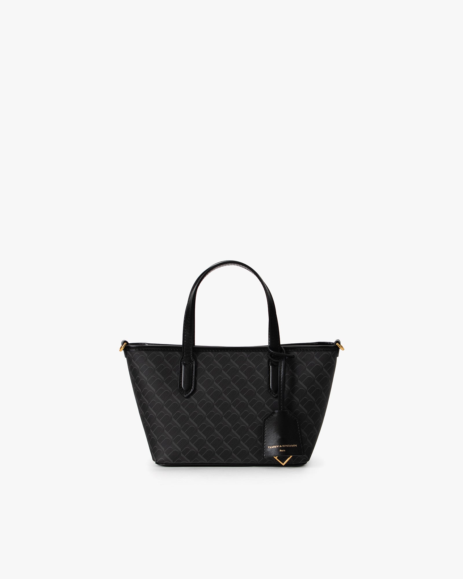 Shopper Nano Monogram noir, vue de face, posé, avec anses en cuir et étiquette cuir de la Maison