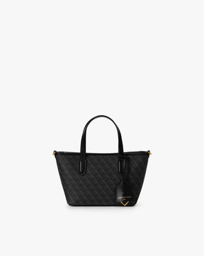 Shopper Nano Monogram noir, vue de face, posé, avec anses en cuir et étiquette cuir de la Maison