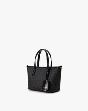 SHOPPER NANO Noir monogram, vue de trois quarts, anses portées main, étiquette cuir pendante