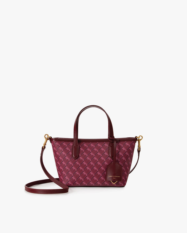 Shopper Nano Bordeaux, vue de face, posé, avec anses courtes et bandoulière amovible