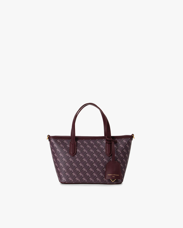 Shopper Nano prune, vue de face, posé, avec ses deux anses en cuir et son porte-adresse