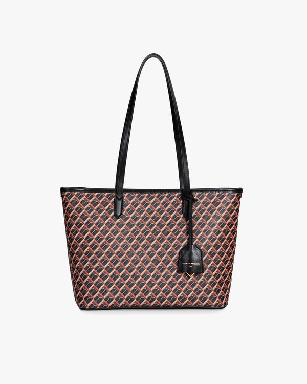 Sac TOTE MONOGRAM PM brun et noir, vue de face, anses plates portées à l'épaule