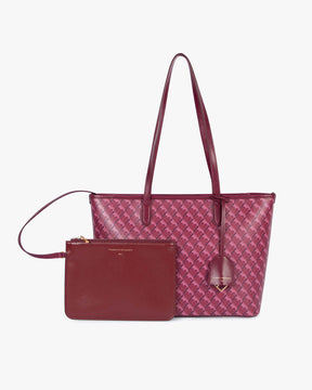 TOTE MONOGRAM PM Bordeaux, vue de face avec pochette amovible assortie et anses plates en cuir