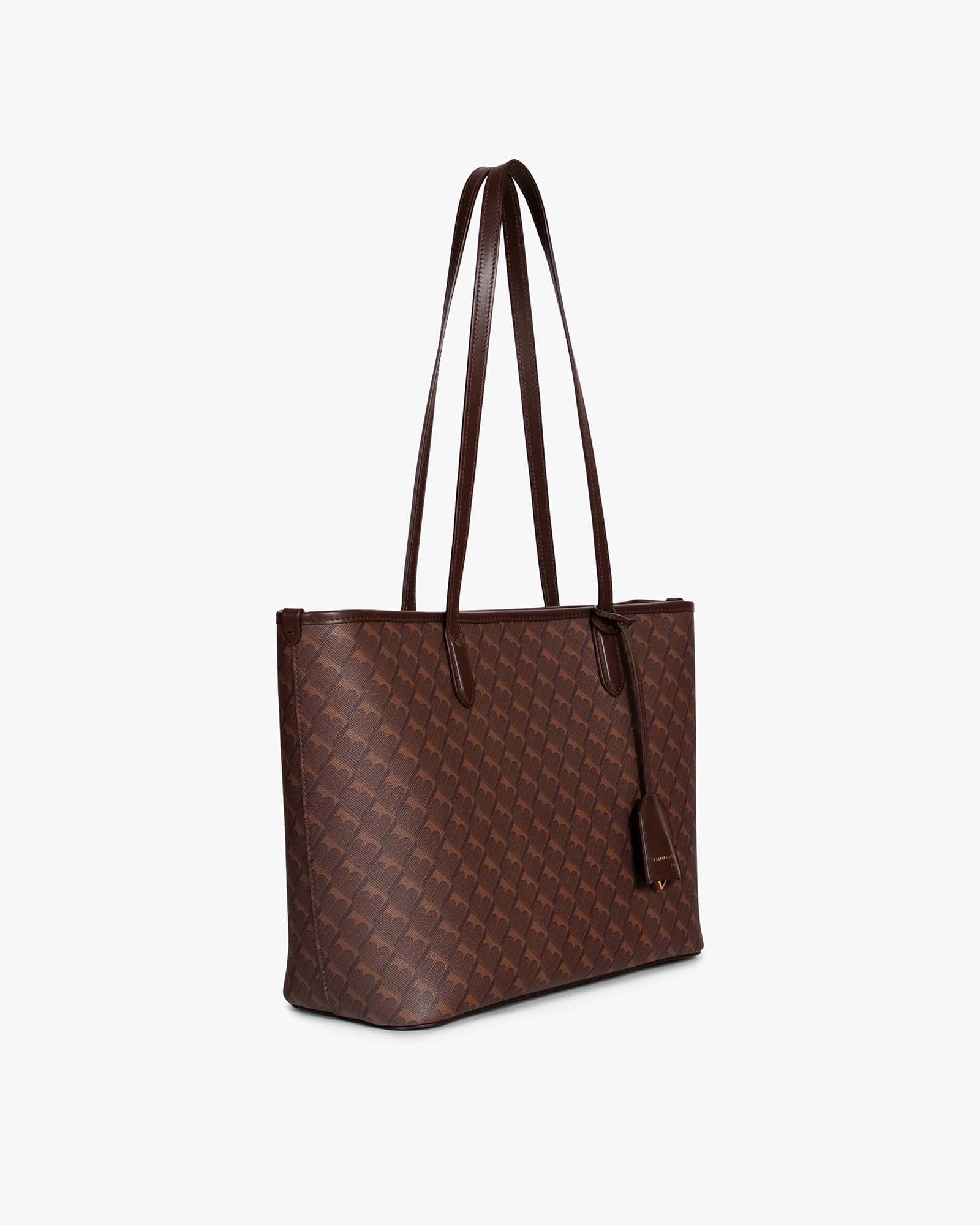 TOTE MONOGRAM PM in chocolate, three-quarter view, flat handles resting on top