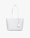 TOTE MONOGRAM PM blanc ivoire, vue de face posé, anses plates et porte-adresse en cuir