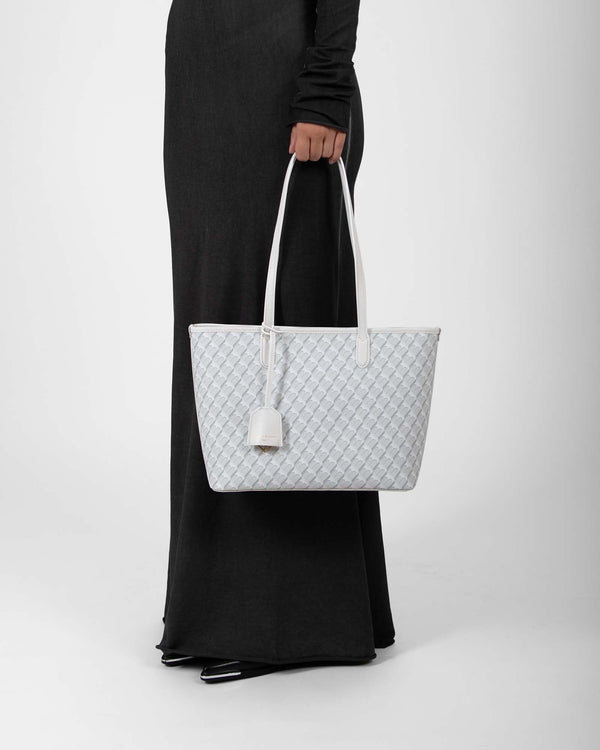 TOTE MONOGRAM PM ivoire, porté à la main, motif monogramme en toile enduite