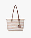 TOTE MONOGRAM PM Tan, vue de face, posé, anses en cuir et porte-nom suspendu