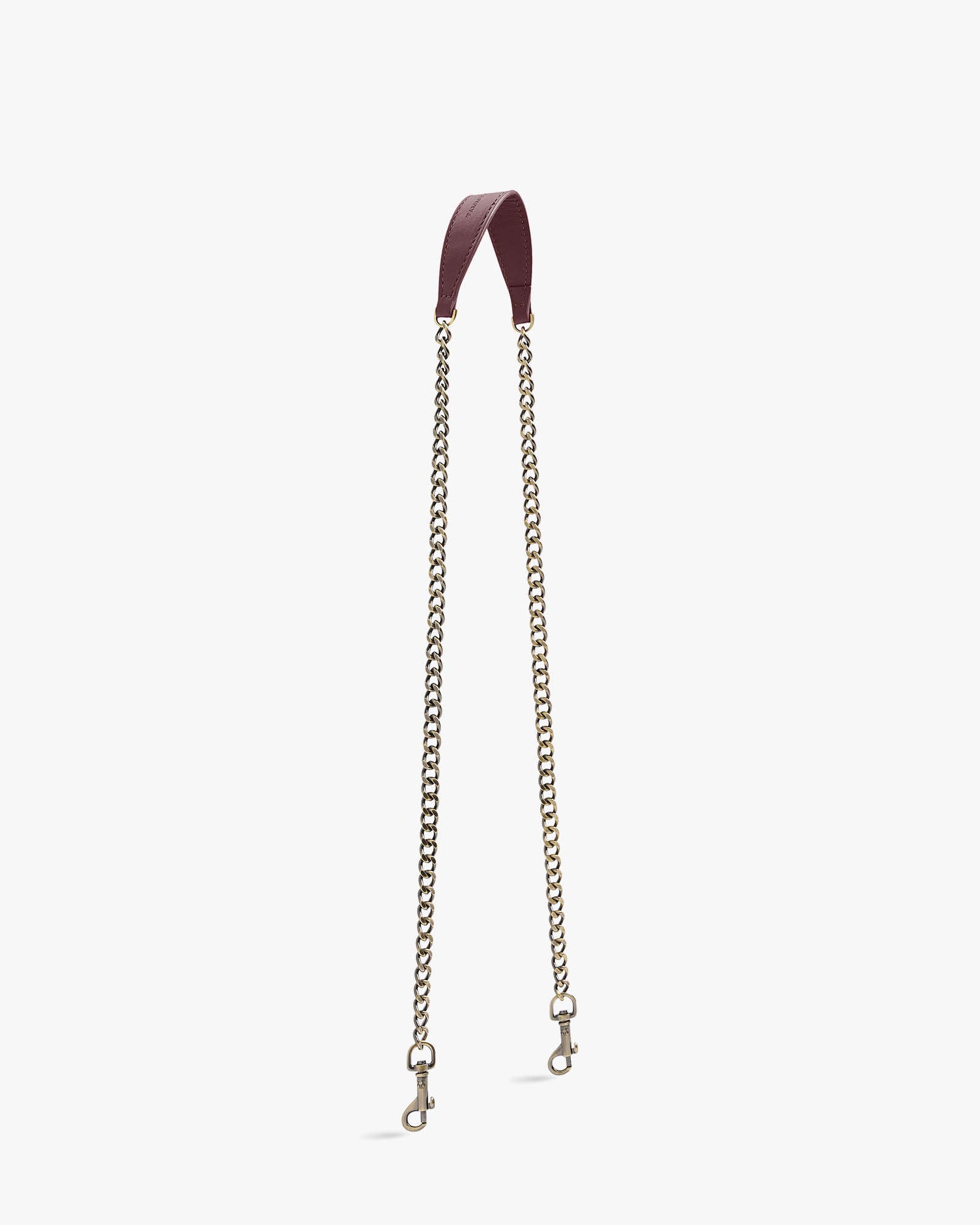 CHAÎNE LONGUE strap in Aubergine, leather shoulder pad, laid flat in a U-shape, clasps visible at both ends