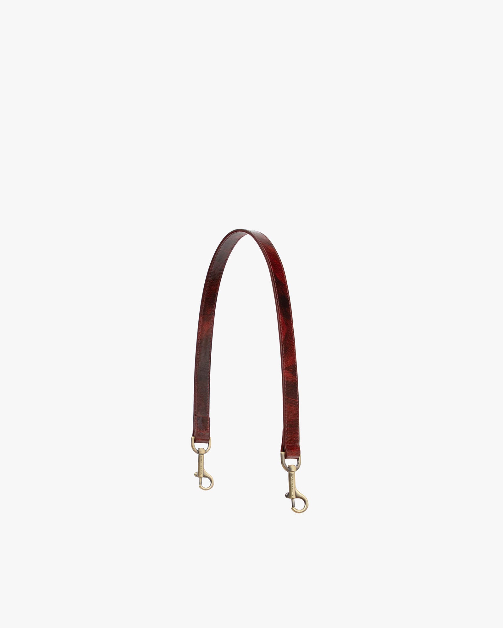 Short strap Marbre in leather, full view with aged brass clasps