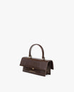 Sac THEA MINI brun embossé lézard, vue de profil, posé, anse courte relevée