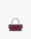 Sac THEA MINI Bordeaux embossé lézard, vue de face, poignée relevée, rabat oversize fermé