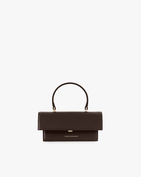 THEA MINI bag in chocolate, front view, standing, with flap and top handle