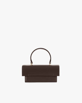 THEA MINI bag in chocolate, front view, standing, with rounded handle and oversized flap