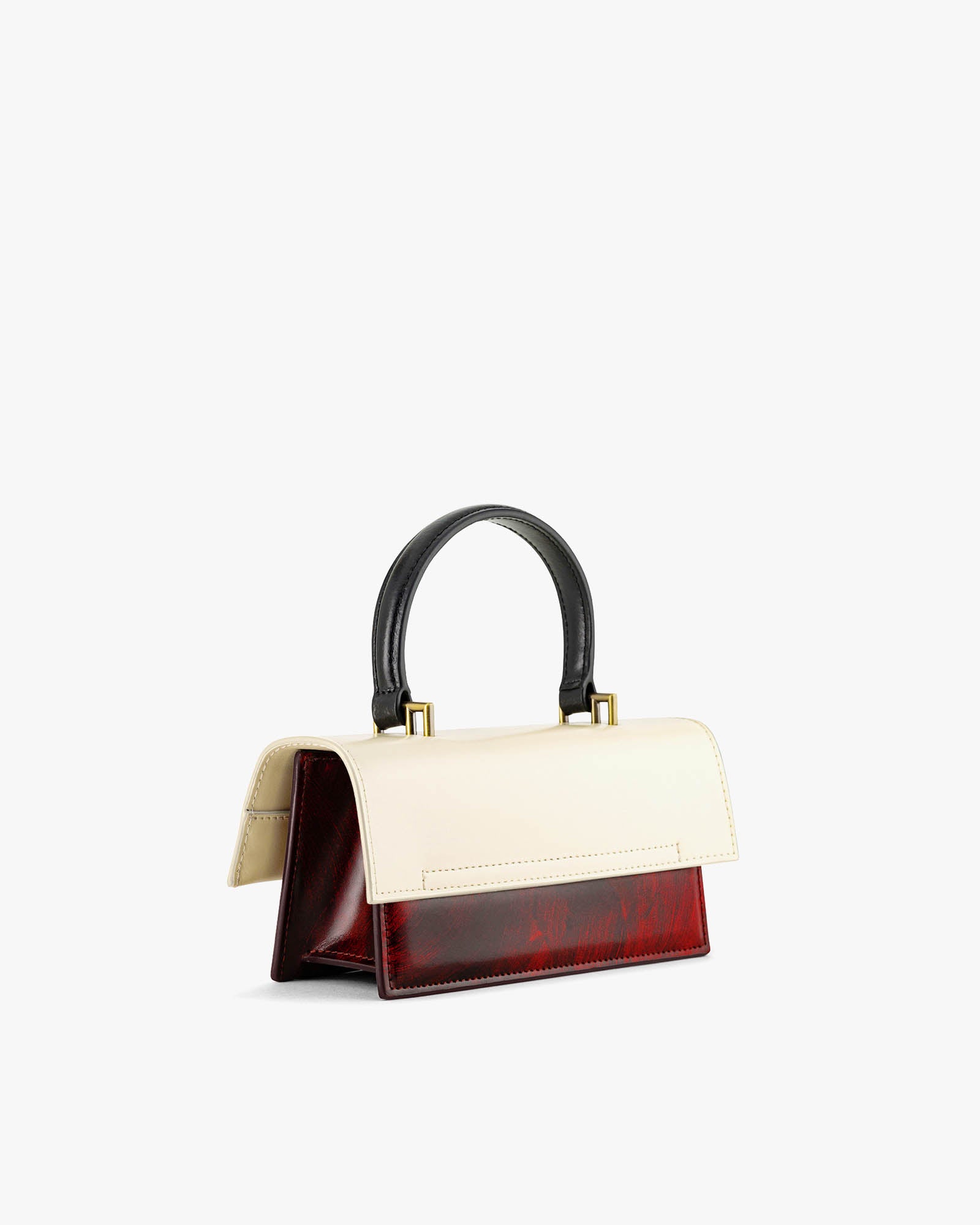 Sac THEA MINI colourblock art déco, vue de trois quarts, poignée noire, rabat ivoire et corps bordeaux