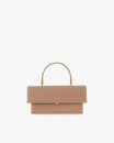 THEA bag in beige, front view, flap closed, top handle, white background
