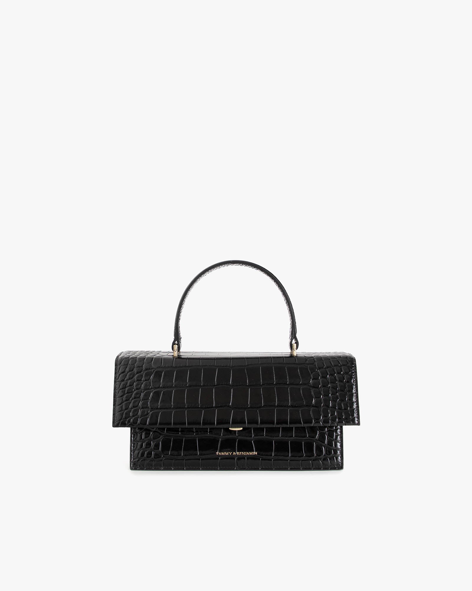 Sac THEA noir embossé crocodile, vue de face, posé, avec poignée rigide