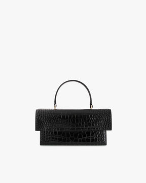 Sac THEA Noir embossé crocodile, vue de face, posé, avec poignée rigide