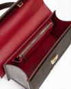 Sac THEA brun embossé lézard, vue intérieure ouverte sur la doublure rouge et la poche zippée