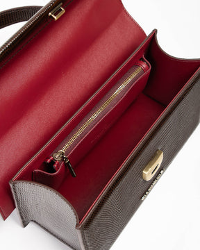Sac THEA brun embossé lézard, vue intérieure ouverte sur la doublure rouge et la poche zippée