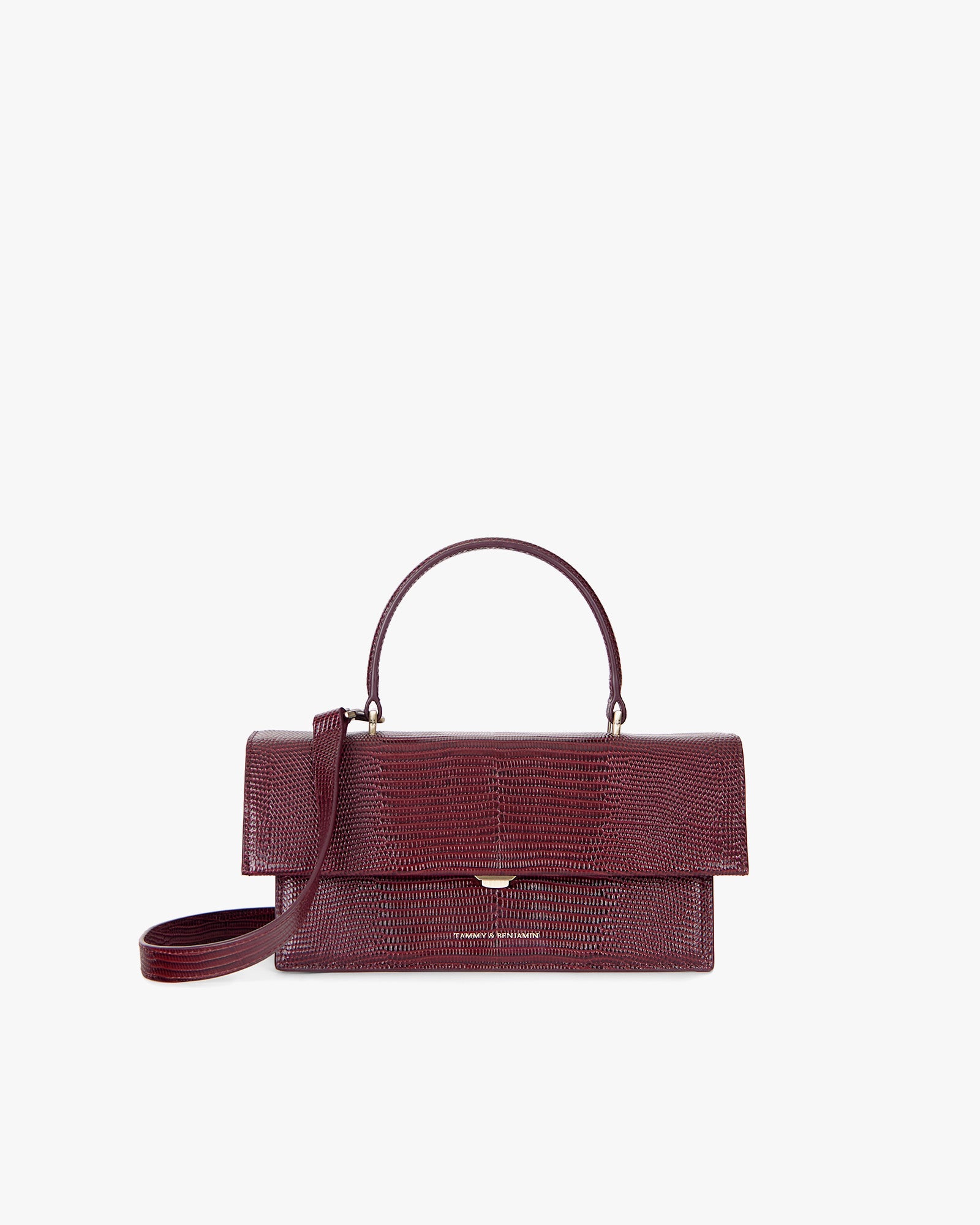 Sac THEA Bordeaux Embossé Lézard, vue de face, posé, avec poignée rigide et bandoulière