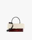 Sac THEA Colourblock art déco de face, rabat écru, base rouge veinée, anse noire et bandoulière