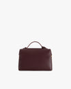Sac VAYA Aubergine de dos, posé, avec anse portée à la main et détail Key Bell doré