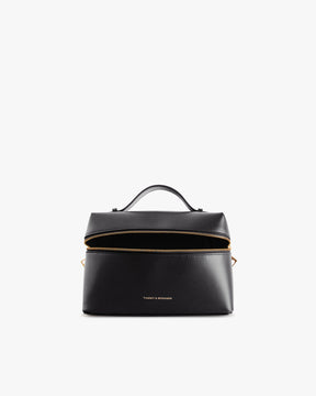 Sac VAYA noir vue de face, fermeture zippée ouverte montrant l'intérieur, anse courte