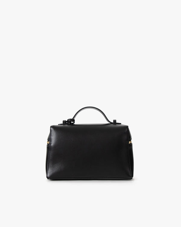 Sac VAYA noir, vue de dos, posé, anse courte relevée