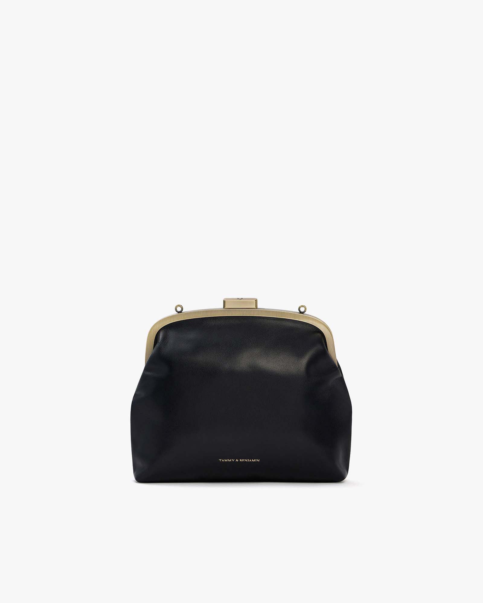 Sac EMMA en noir, vue de face, posé, fermoir doré vintage visible, sans bandoulière