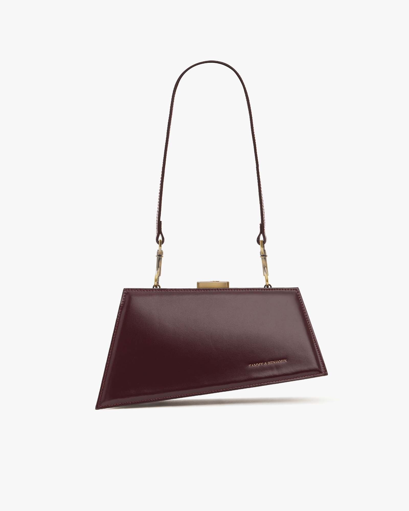 Sac JAY Mahogany de face, posé, anse haute et bandoulière amovible, fermoir doré apparent