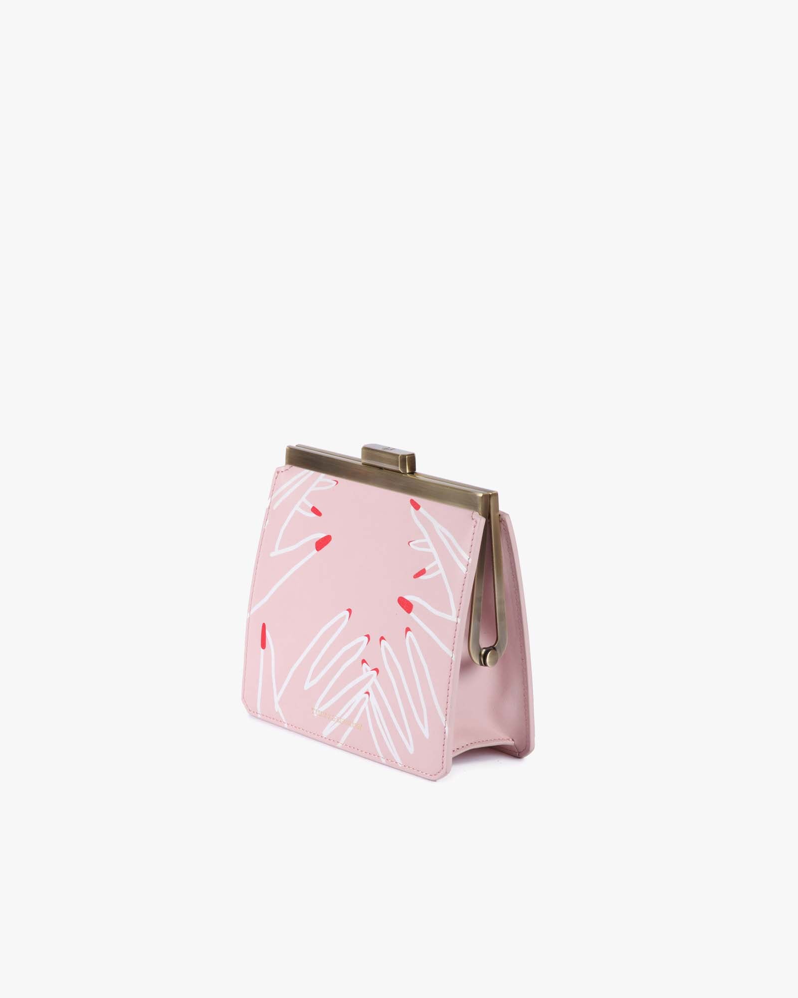JEANNE bag in Imprimé Mains, three-quarter view, closed gold metal clasp, no strap
