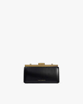 Sac JEANNE BAGUETTE noir, vue de face, posé, fermoir doré rétro fermé