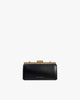 Sac JEANNE BAGUETTE noir, vue de face, posé, fermoir doré rétro fermé