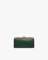 Sac JEANNE BAGUETTE vert émeraude, vue de face, posé, fermoir doré rétro fermé