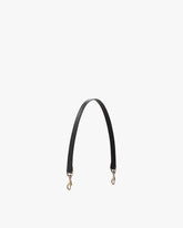 Short strap in black naplak leather, arched, aged brass clasps at both ends