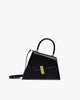 Sac CUBIST noir en cuir, vue de profil, poignée ronde relevée, fermoir doré et bandoulière fine